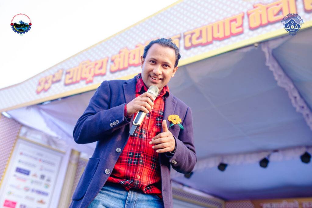 A man singing and posing for camera